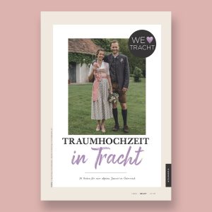Das Cover des Trachten Specials vom Braut und Bräutigam Magazin. Zu sehen ist ein Brautpaar in Tracht auf einer Wiese