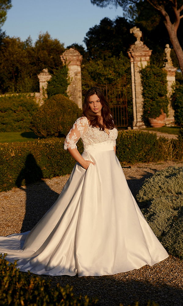 Klassisches Hochzeitskleid mit edlem Design und dezentem Schimmer, für Bräute, die Eleganz lieben.