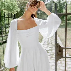 Die schönsten Hochzeitskleider mit Ärmeln