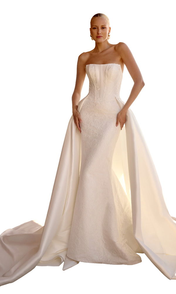 Schlankes Brautkleid mit Korsettoberteil und langer Schleppe – minimalistischer Chic für modebewusste Bräute.