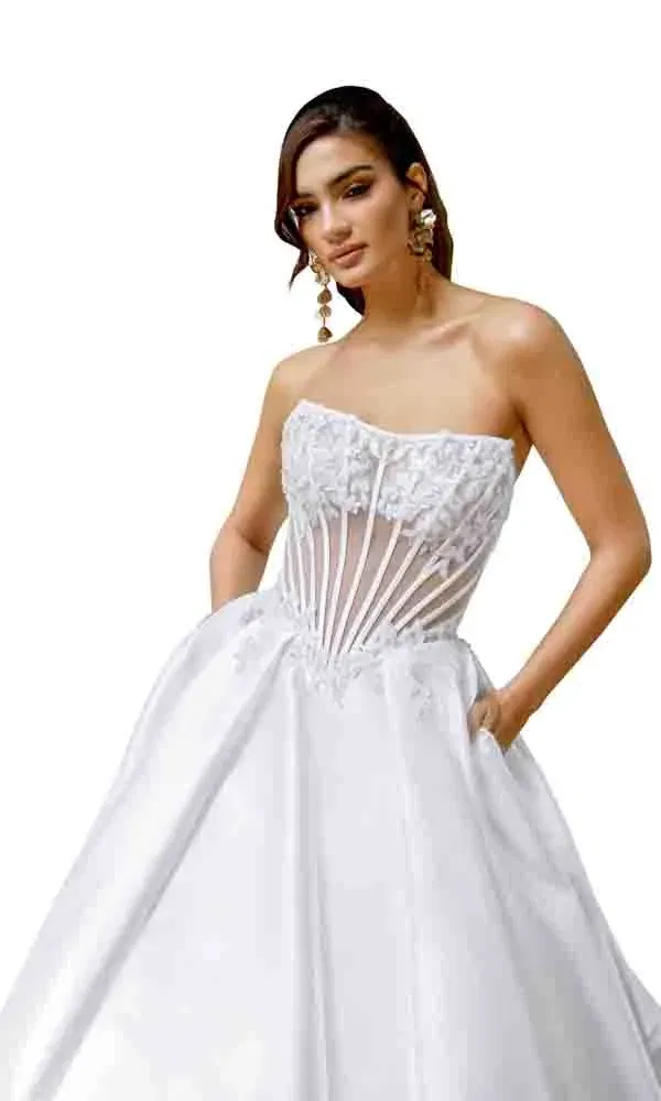 Prinzessinnenkleid mit aufwendig besticktem Bustier und weitem Rock im romantischen Brautmode-Stil.
