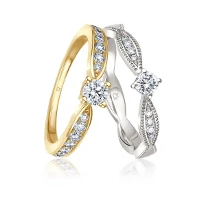 Zwei elegante Verlobungsringe in Gelb- und Weißgold mit Diamantbesatz und funkelndem Solitär